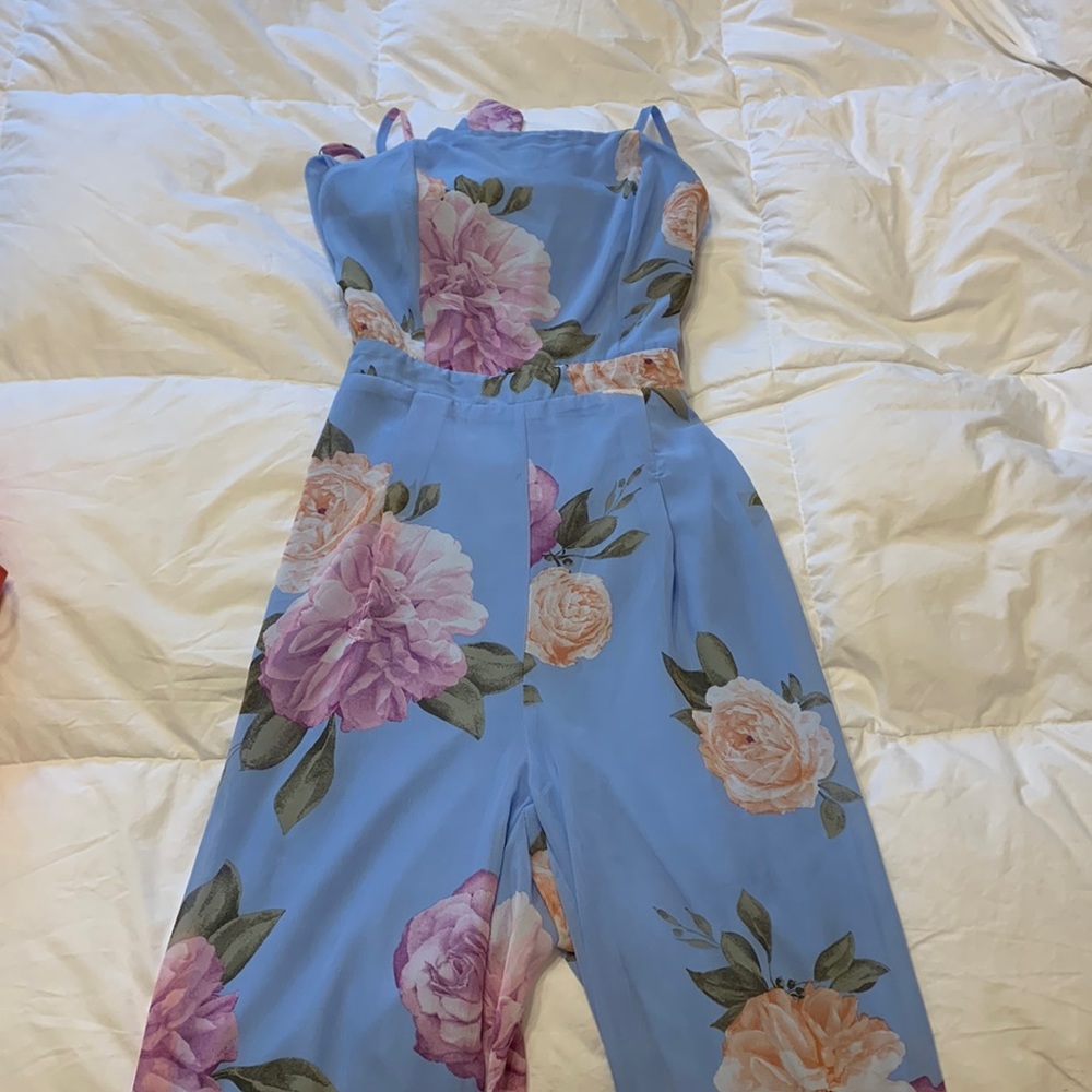 Papaya jumpsuit with adjustable straps and open back! Size - S